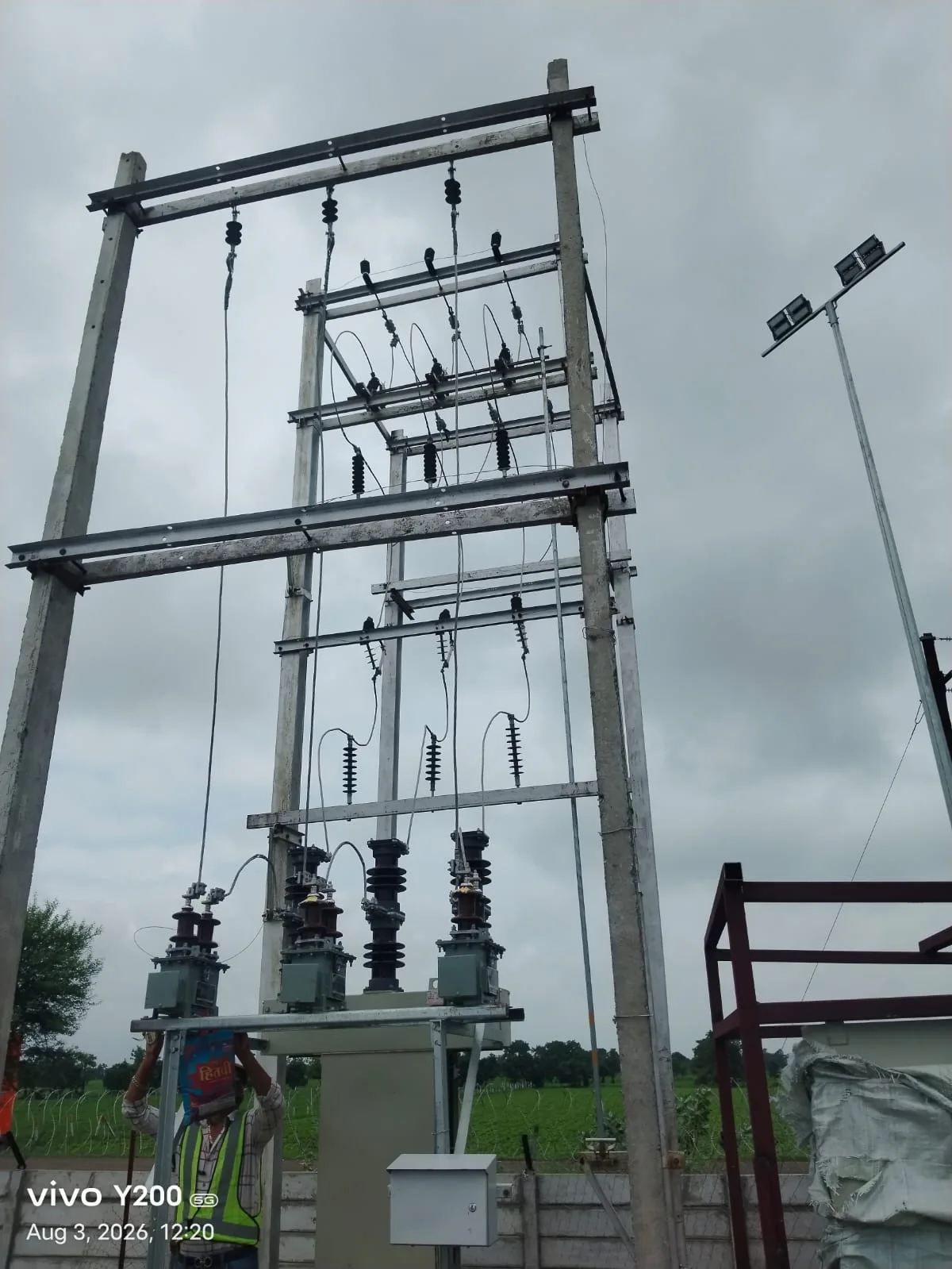 Electrical transmission pole and transformer structure