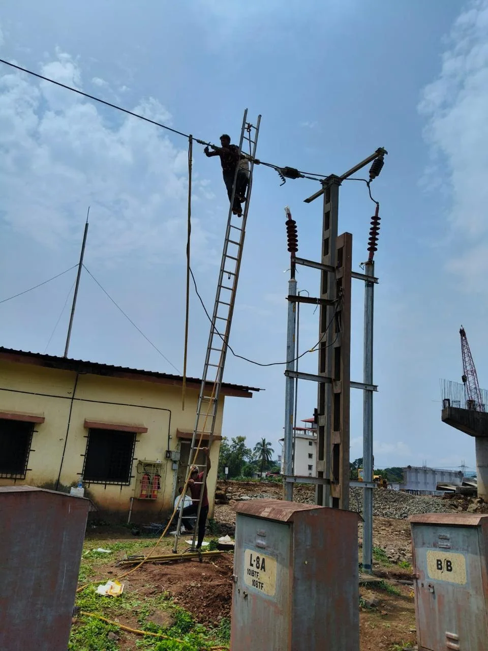 OHE outrigger erection and feeder wire jumper adjustment, Mangaon
