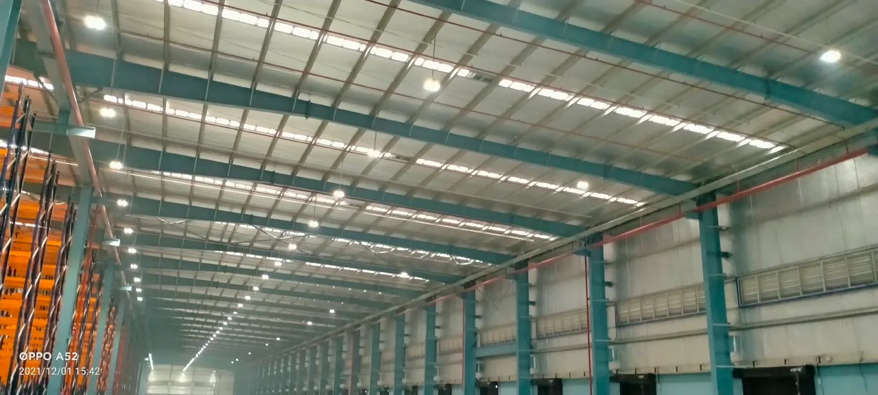 PEB warehouse interior showing structural columns and roof purlins