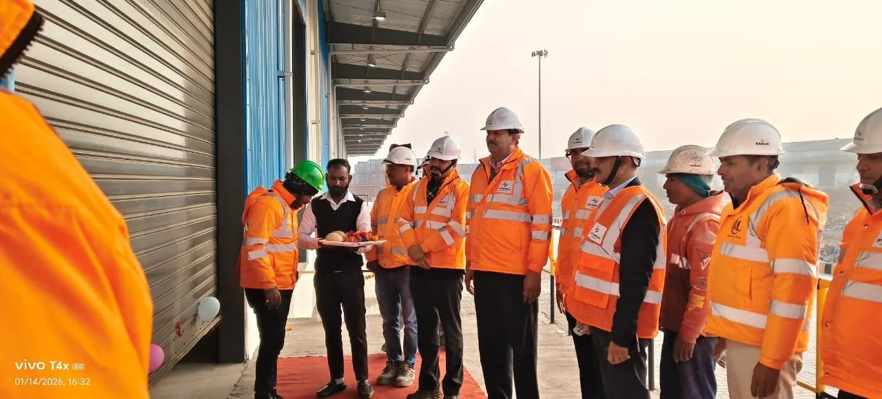 Prasad distribution at a facility inauguration ceremony