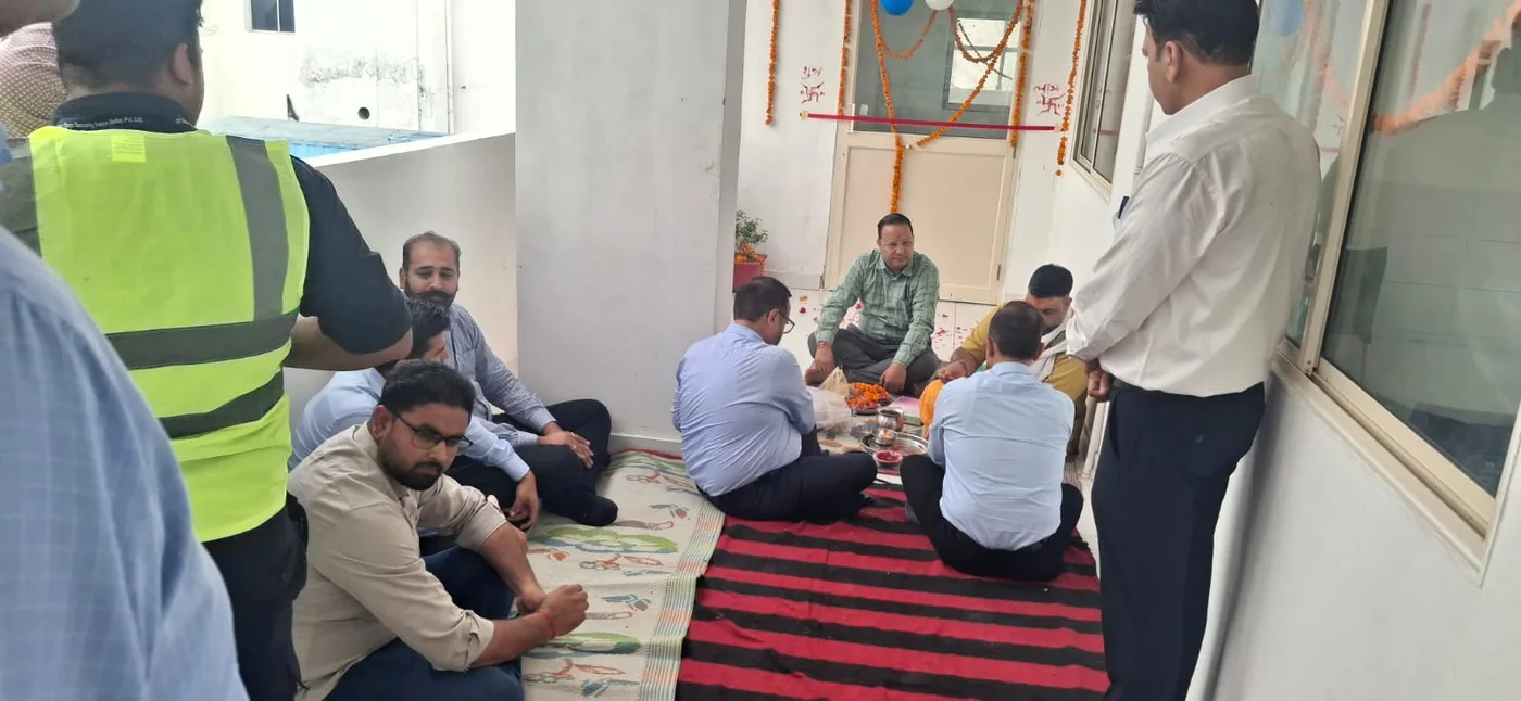 Puja ceremony with the project team ahead of a facility handover