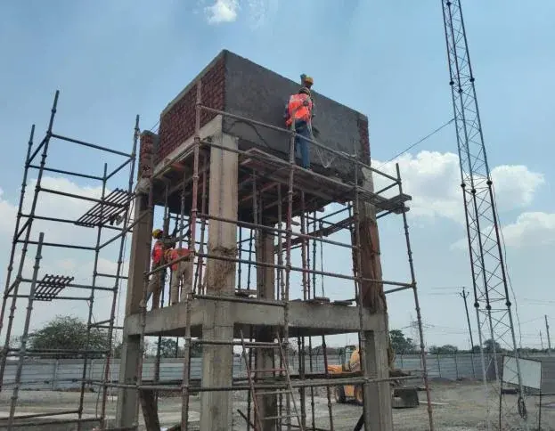 Elevated structure under construction with scaffolding